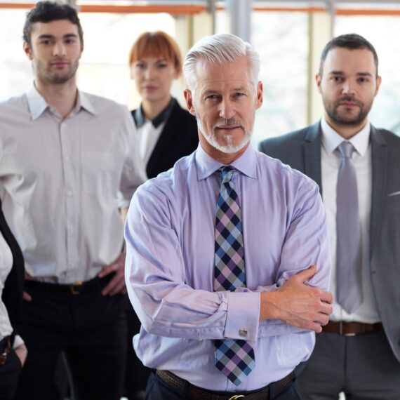 senior business man with his team at office